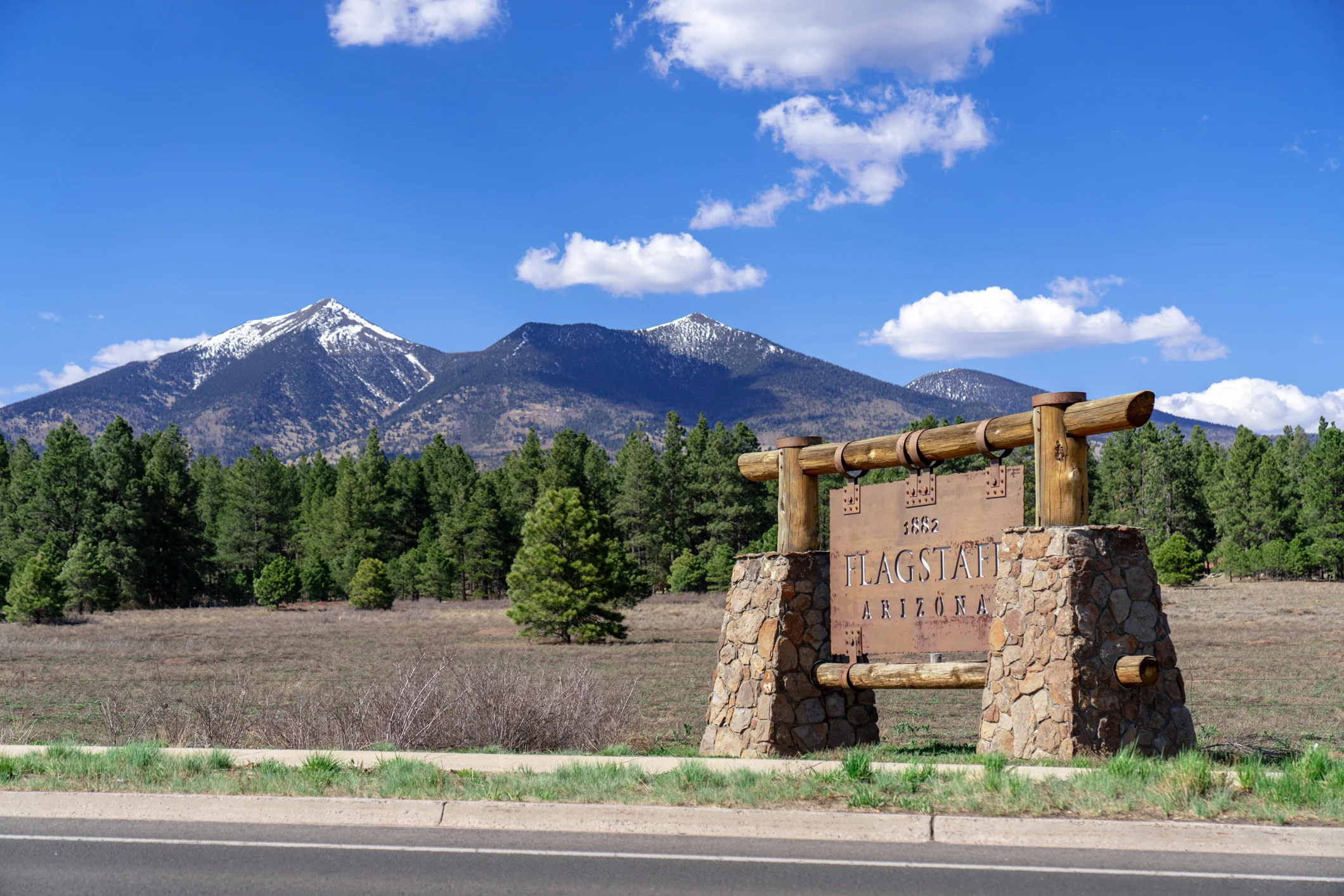 Flagstaff Arizona with the San Francisco Peaks, including Mount Humphreys, in the background