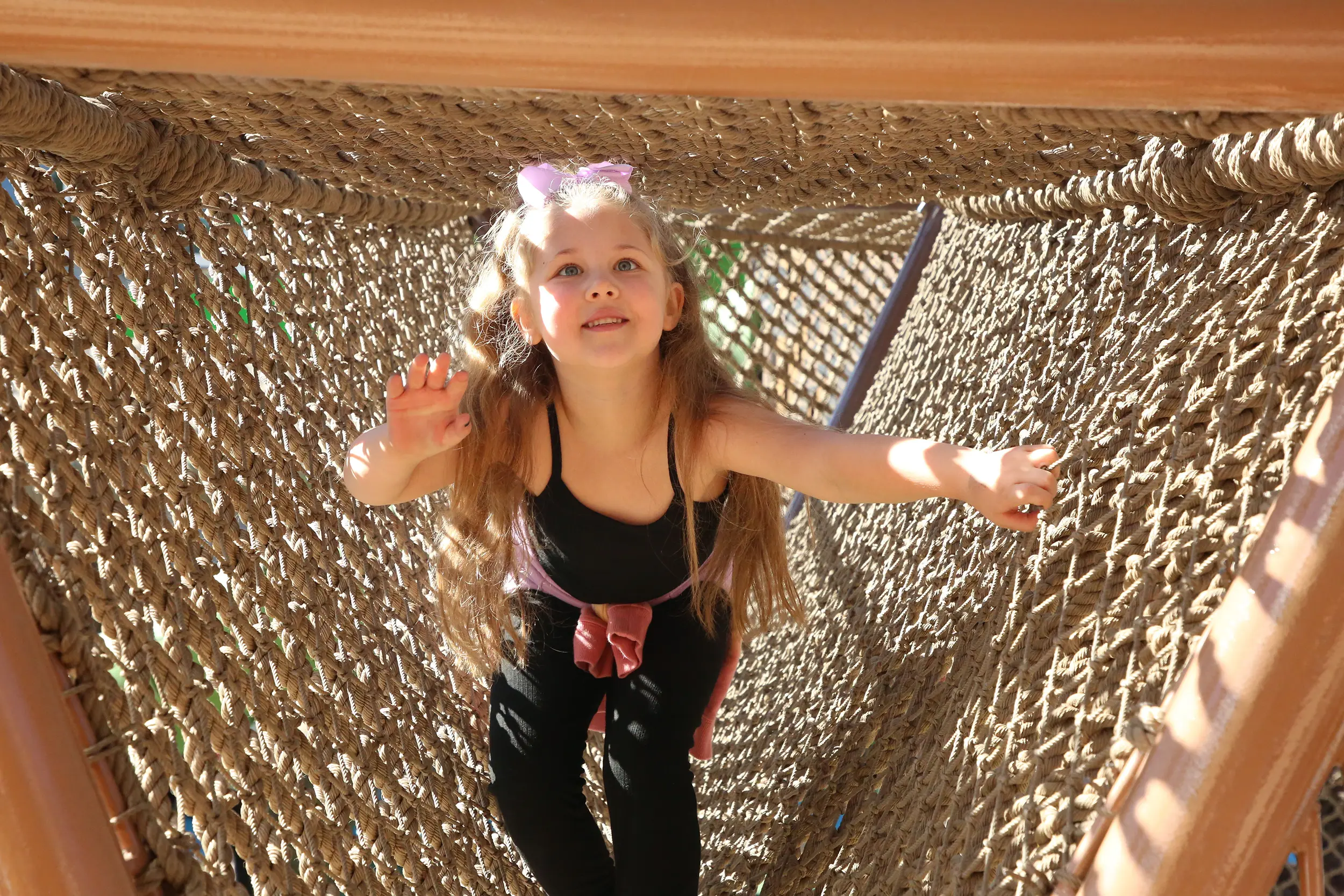 A girl playing at Reid Park Zoo